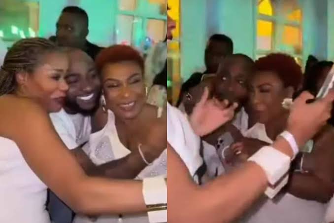 Davido Warmly Greets Burna Boy’s Mum At Tony Elumelu’s Party